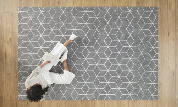 Tapis géométrique gris