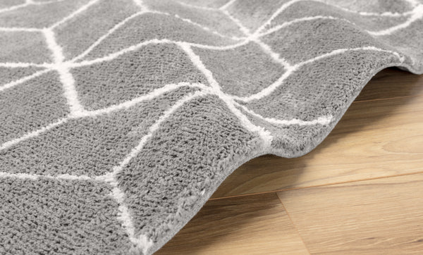 Tapis géométrique gris